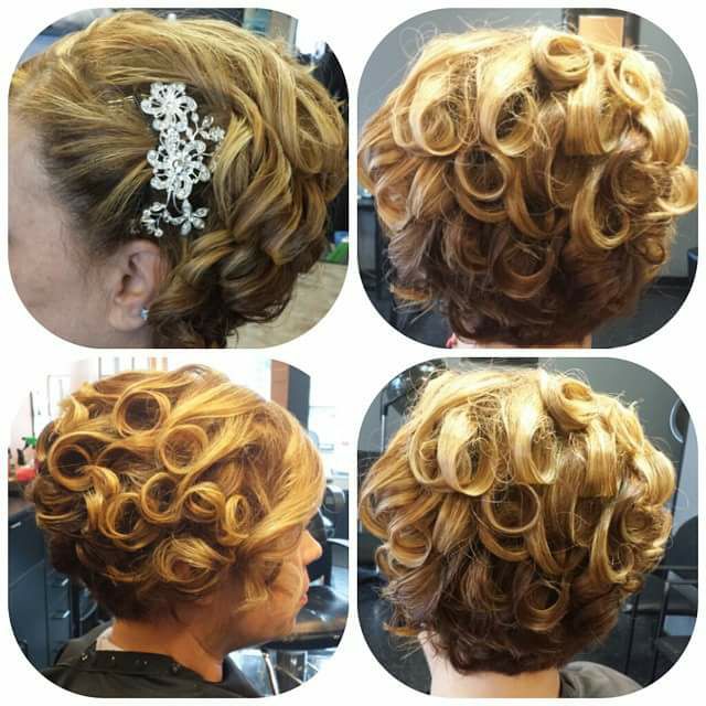 Bridal updo with crystal hair piece and curls
