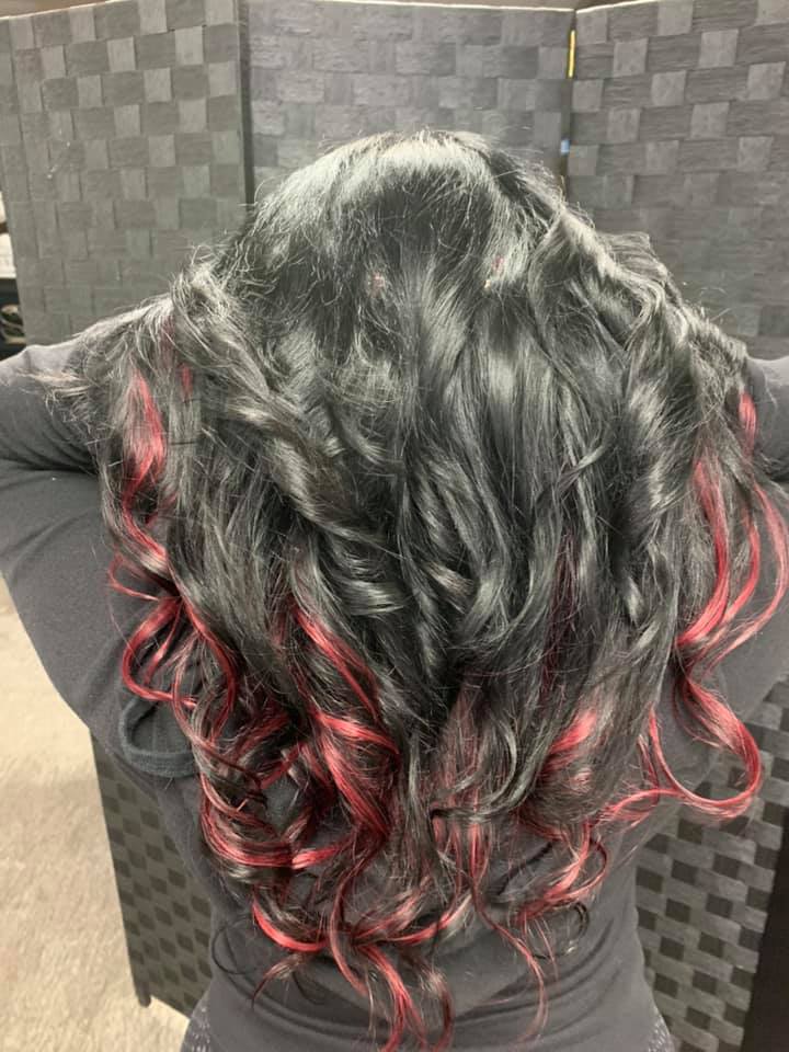 Dark hair with rose pink underlights and curls